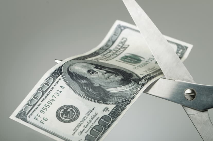cutting money in half